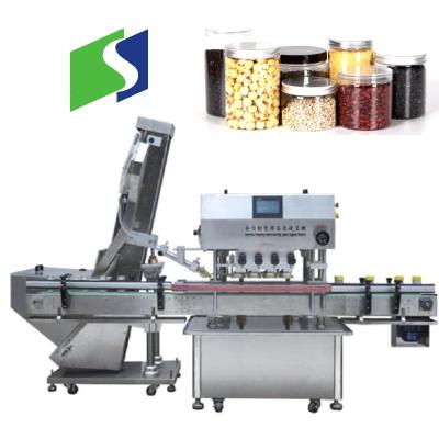 China Food Automatic Small Bottle Filling Capping Labeling Machine With Bottle Unscrambler for sale