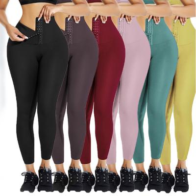 China Breathable Butt Lift Gym Breathable Adjustable Waist Hooks Solid Color Elasticity Cuffs Seamless Yoga Pants for sale