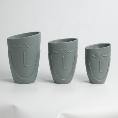 China Mediterranean Face Effect Planter Embossed Flower Pot For Wholesale Mini Cement Flower Pots for sale