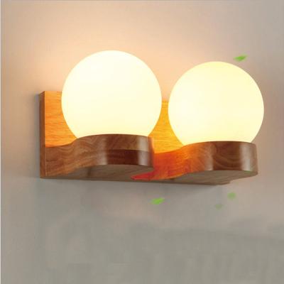 China Modern Nordic Japanese-style modern solid wood wall lamp Warm living room corridor balcony porch bedroom bedside spherical wall lamp for sale