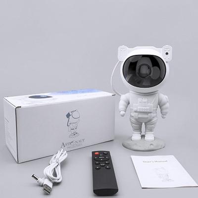 China Rotating multi-color rotatable astronaut projection lamp remote control dimmable decoration light projection lamp night light for sale