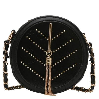 China Solid PU Round Case Rivets Tassel Black Messenger Shoulder Crossbody Bags For Women Purse 2019 for sale