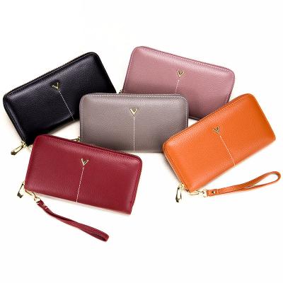 China Waterproof Genuine Leather Purses For Girls Designer Ladies Wallets Coin Purses Women's Long Clip for sale