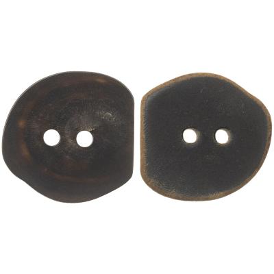 China Sustainable Irregular Shape Horn Buttons For Designer Clothing 2 Hole Genuine Horn Buttons Black Scorched Original Wholesale Stock for sale