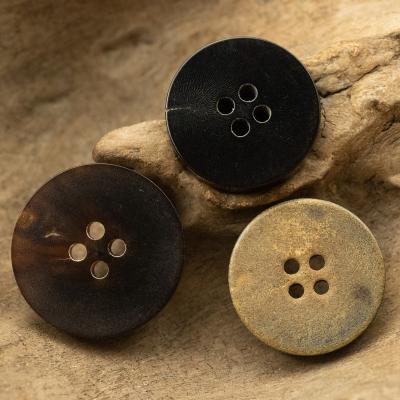 China Sustainable Double Flat Genuine Horn Buttons 4 Hole Black Dark Brown Scorched Effect Factory Wholesale Large Stock For Suit Shirt Coat for sale