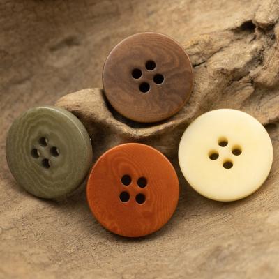 China Sustainable Flat Surface Corozo Button Full Size 12.5mm Colorful Casual 4 Hole Natural Material Wholesale Factory for sale