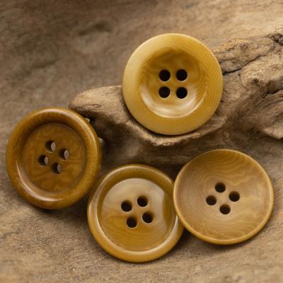 China Sustainable Ginger Yellow Corozo Suit Buttons Classic Shape Round Rim Bowl Shape 15mm/18mm/20mm/23mm/25mm Wholesale Price High Quality for sale