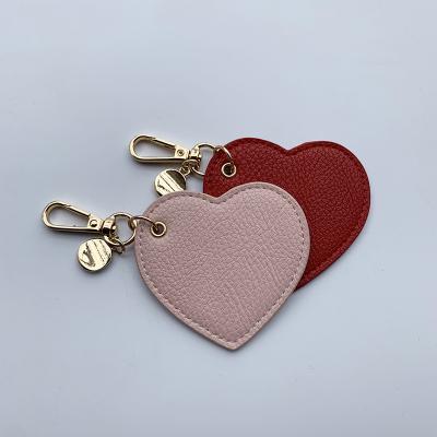 China Genuine leather for christmas gift wholesale personal logo keychains soft genuine leather luxury set for sale