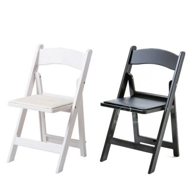 China Padded Foldable Plastic Chairs Resin Plastic Fold Up Chairs 690pcs/20ft Loading for sale