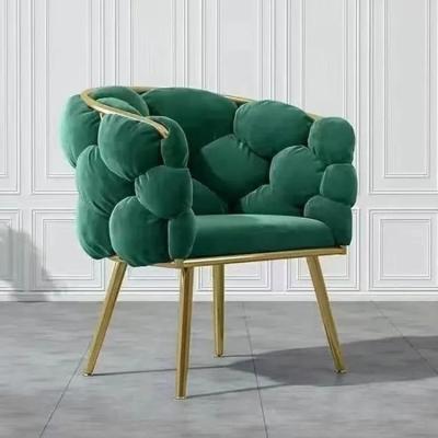 China Customized Green Upholstered Dining Chairs Metal Legs Fabric Velvet Dining Armchair for sale