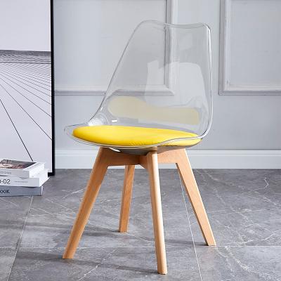 China Transparent Plastic Tulip Dining Table Chairs PU Cushion Beech Wood Legs for sale