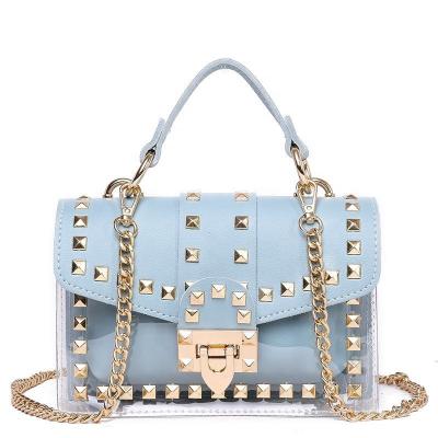 China 2021 Fashion Lady PVC Handbg Purse Mini Female Bags Quality Women Cross Shoulder Handle Top Rivet Jelly Bag for sale