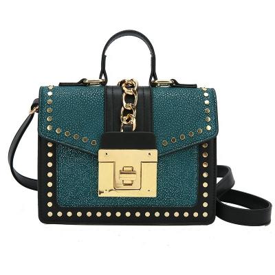 China 2021 Fashion Fashion Matte PU Leather Top Handle Handbags Cross - Body Shoulder Bag Women's Handbags Small Rivet Bag for sale