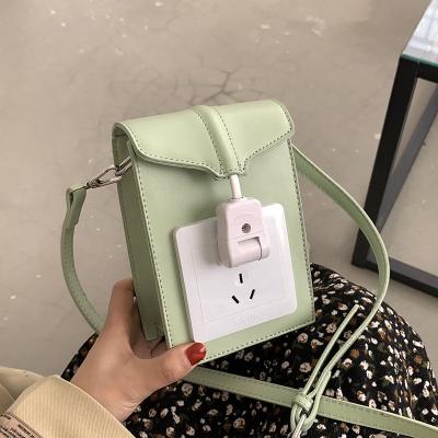 China 2022 Hot New Fashion Drop Shipping Solid Color Joint Cavity Shape Unique Messenger Bags Women Cute Mini Bag Cross Shoulder Purses for sale