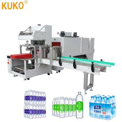 China Automatic CLOTHING PE film shrink wrap packing machine bottle shrink wrap packaging machine for sale