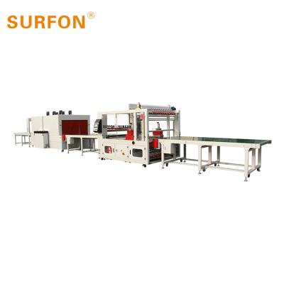 China High Speed ​​Full Automatic Chemical Grade High Quality Candle Shrink Paper Wrapping Machine For Door for sale