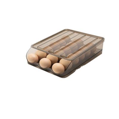 China Creative Convenient Storage Box Egg Rolling Design Kitchen Refrigerator Automatic Scrolling Egg Tray for sale