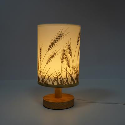 China Modern simple creative personality modern hotel fabric bedside bedroom living room decorative table lamp for sale