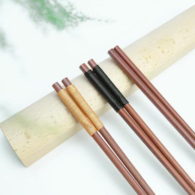 China Durable Japanese wooden chopsticks with anti-slip and anti-rolling stocking wrapped wires directed wooden chopsticks for sale