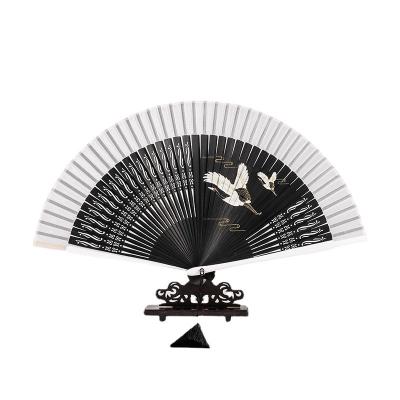 China China 2023 Chinese carved wooden wedding fan folding hand fan Japanese personalized kongfu fan for sale