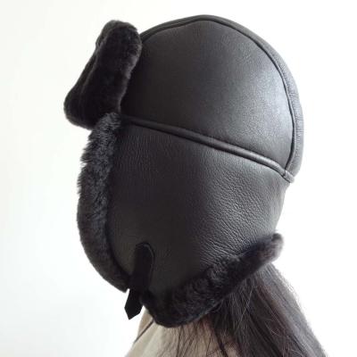 China JOINT Russian Leather Cap Shearling Cavalry Australian Trapper Ushanka Hat 5 Panel Lamb Fur Earflaps Winter Sheepskin Women Men for sale