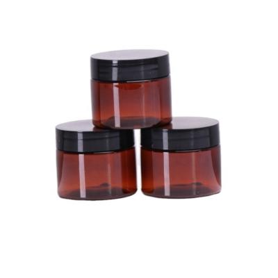 China Hot Sale 50ml Empty Cosmetic Hair Gel Food Container Large Amber Plastic Cream Jar With Black Screw Lid for sale