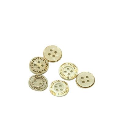 China Sustainable Factory Custom Wholesale Coconut Buttons Engraved Garment Buttons For Kid Clothing for sale