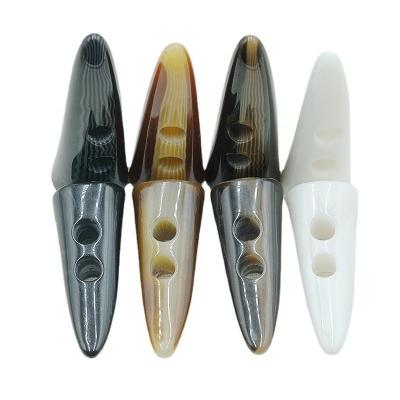 China Resin Washable Horn Factory Production Button 2-Holes Toggle Button For Clothing Coat Anorak for sale