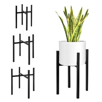 China Eco-friendly Nordic Living Room Stand Flower Pot Cross Wrought Iron Indoor Flower Pots And Planters for sale