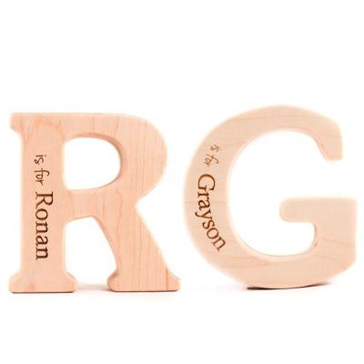 China Organic Wholesale Custom Alphabet Train Organic Teething Toys Wooden Teethers For Babies for sale