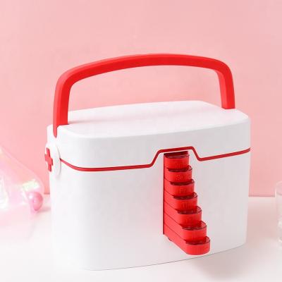 China Automatic toothpaste dispenser medicine storage box home first aid kit comes with an extra large 7-day pill box for sale