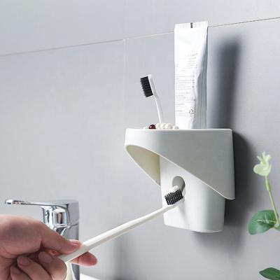 China Sustainable Wall Mounted New Plastic Wall Mount Bathroom Hands Free Toothpaste Vending Machine for sale