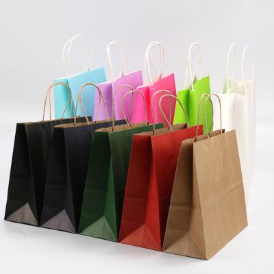 China Recycled materials 100pcs 33x25x12cm recycled custom kraft paper gift bag with handle for shopping bag with your own logo for sale