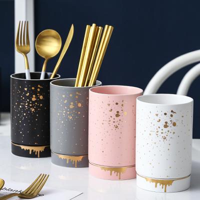 China Sustainable Nordic Ceramic Chopstick Holder Gold Printed Custom Kitchen Utensil Holder For Restaurant Household for sale