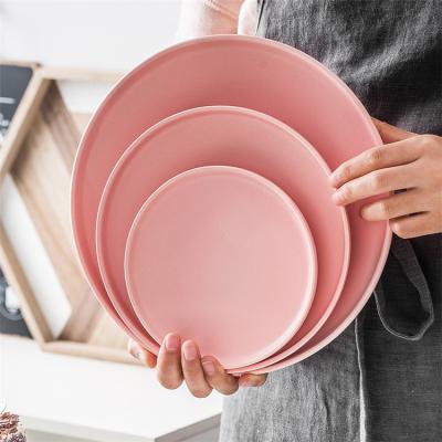 China Sustainable Tableware Competitive Prices Restaurant Used Pink Flat Plate Ceramic Dishes Wedding for sale