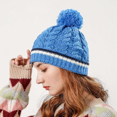 China COMMON Beanie Winter Hat Cable Knitted Hat Knit Beanie Hat With Pom Pom for sale