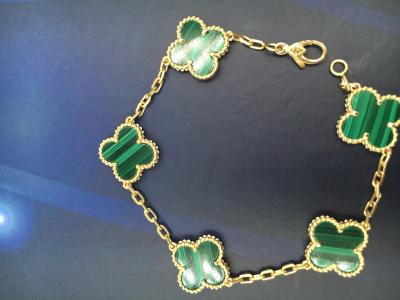 China Van Cleef & Arpels New Style Handmade buckle Vintage Alhambra bracelet, 5 motifs, 18K yellow gold, malachite.VCARL80900 for sale