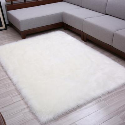 China Snowy White Faux Sheepskin Fur Rectangle Anti-Slip Wholesale Blanket And Rug for sale