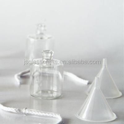 China Clear Glass HOLIDAY Oil Candle For Christmas Holiday Decorative Bottles Oil Candle for sale