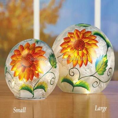 China Gorgeous lead glass home decoration glass ball with fall leaf crackle glass ball for harvest festival for sale