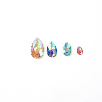 China Handmade Fine Colored Flat Back Stones And Powder AB Resin Drop Rhinestone Crystals Sewing 2 Holes Suit for sale