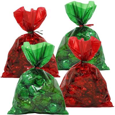 China Disposable Customized Plastic Size Logo Christmas Hot Sale Gift Bag Candy Cookie Packaging Bag for sale