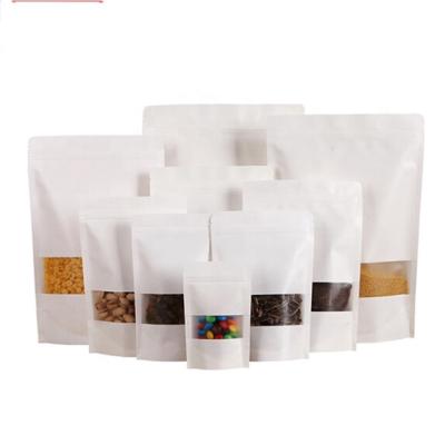 China Custom White Paper Food Kraft Paper Bags For Food Packaging Stand Up With Clear Window And Zipper for sale