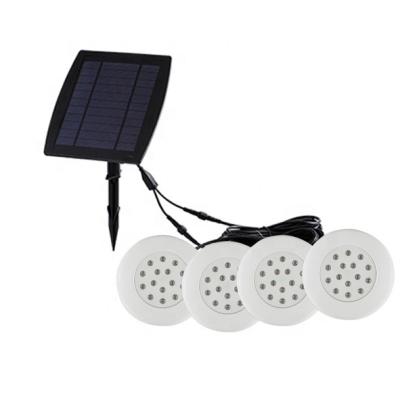 China Residential High Quality ABS Plastic IP65 RGB WW Led Solar Underwater Light For Swimming Pool Light for sale