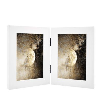 China Hot Selling DIY Wholesale Custom 5x7 Double Picture Frame Vertical Hinged Photo Frame 2 Opening Folding Family Frames Collage for sale