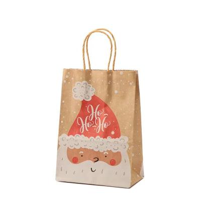 China Biodegradable Cheap Paper Shopping Bags With Logo Printing Kraft Bag Christmas Paper Gift Shopping Paper Packaging Bags for sale