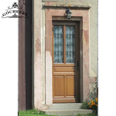 China Waterproof Solid Wood French Wooden Front Entry Iron Door Wrought Iron Wood Door for sale