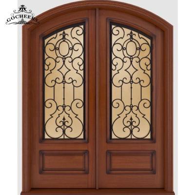 China Waterproof French Solid Wood Front Entry Wrought Iron Door Iron Wood Door for sale