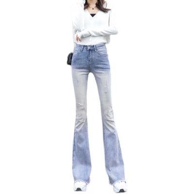 China QUICK DRY the manufacturer directly sells the autumn high waist, broken hole, micro La women's jeans, slim fit, light color trumpet pants for sale