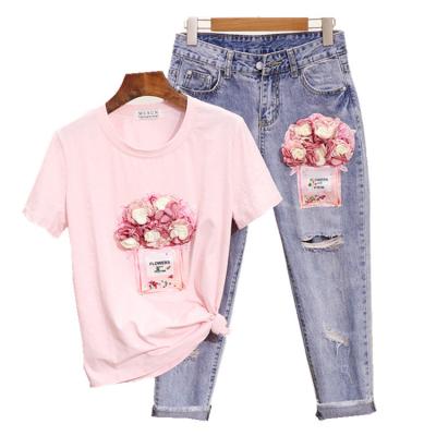 China Anti-pilling Ladies Suits Sequined Perfume Bottles Pattern 3D Flower Short Sleeve T-shirt + Mid Calf Jeans 2 PCS Clothing Sets Suit for sale